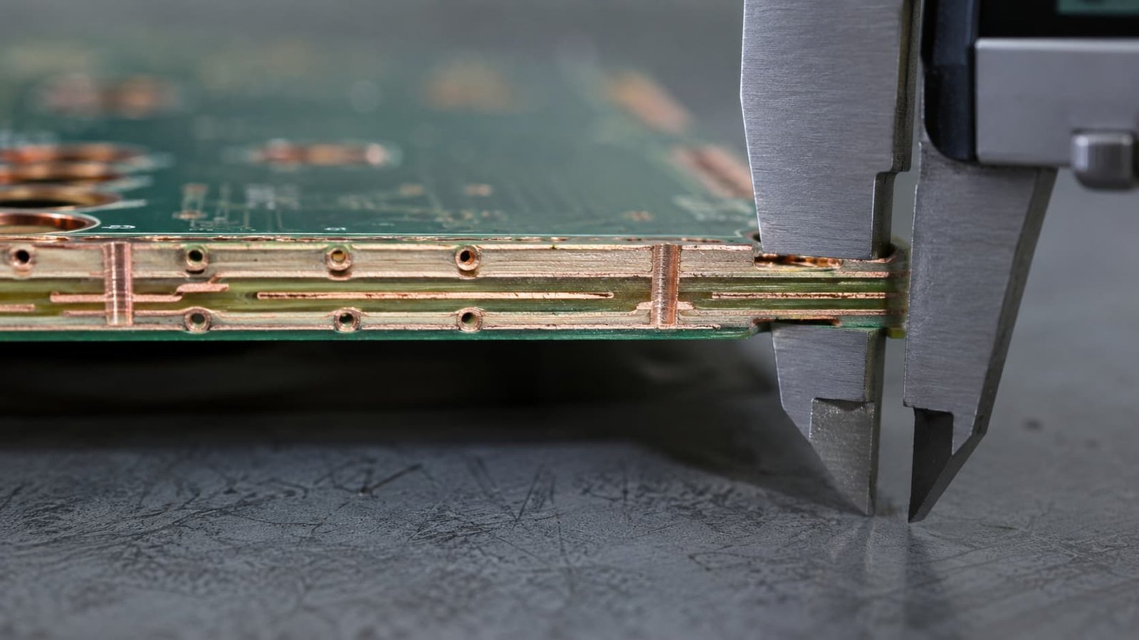 Microwave PCB cross section showing dielectric layer copper layers plated holes and material thickness inspection