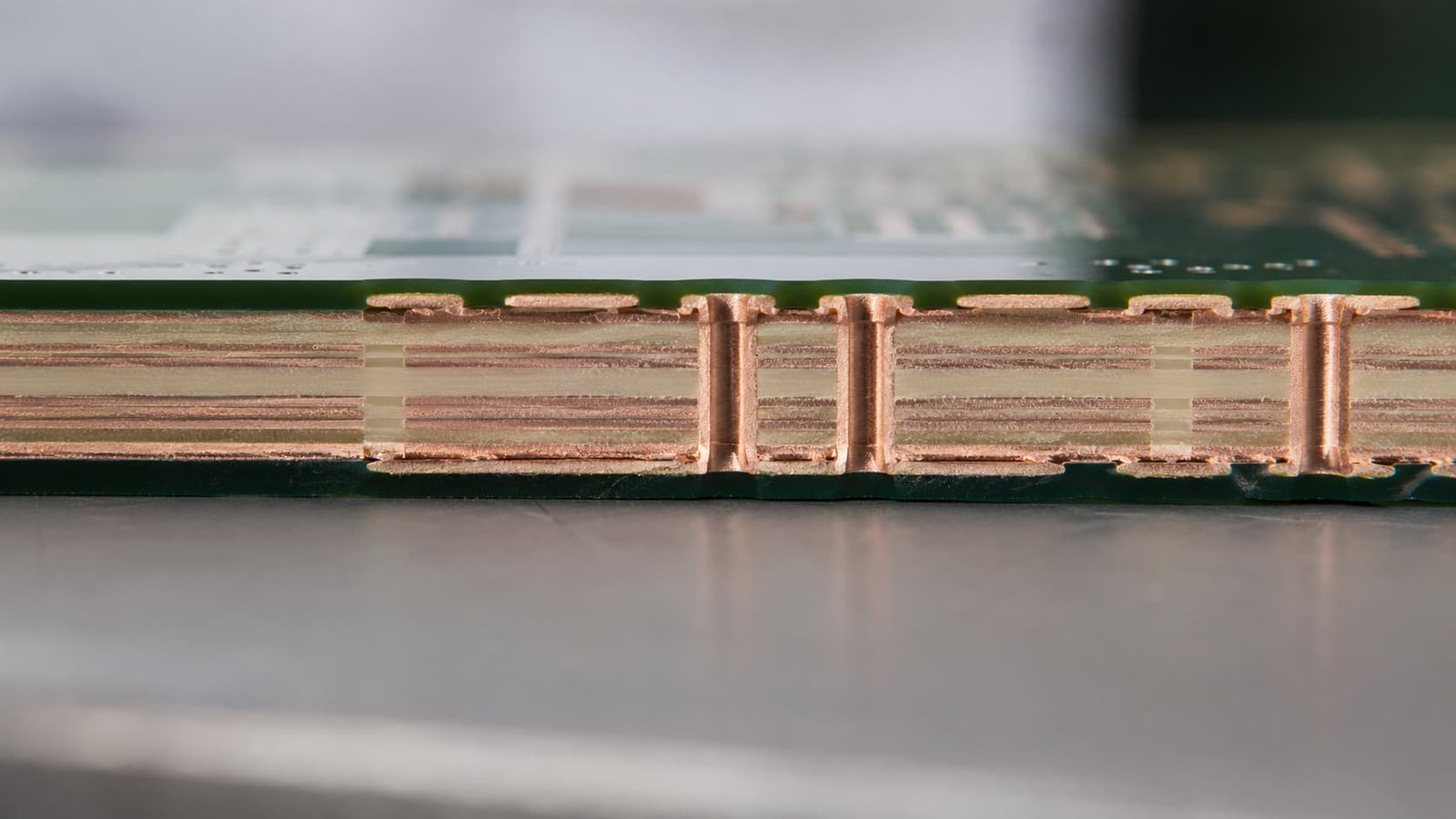 Side by side visual comparison of Rogers RO3000 series PTFE composite and RO4000 series hydrocarbon ceramic RF circuit boards.