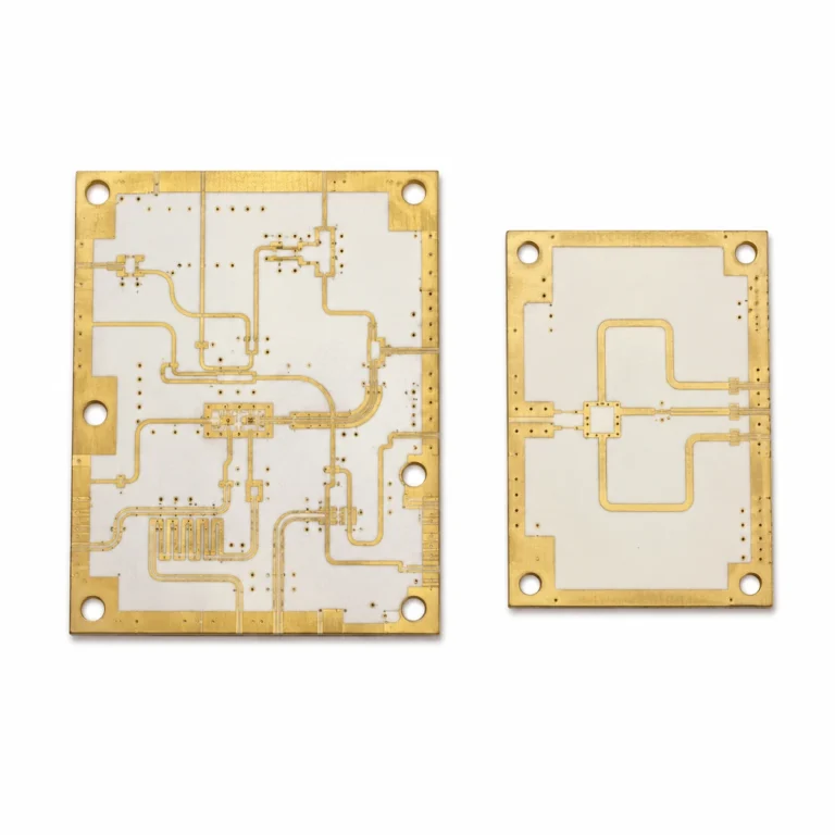 Two Rogers PCB boards side by side showing RO4350B and RO4003C hydrocarbon ceramic substrates with microstrip traces