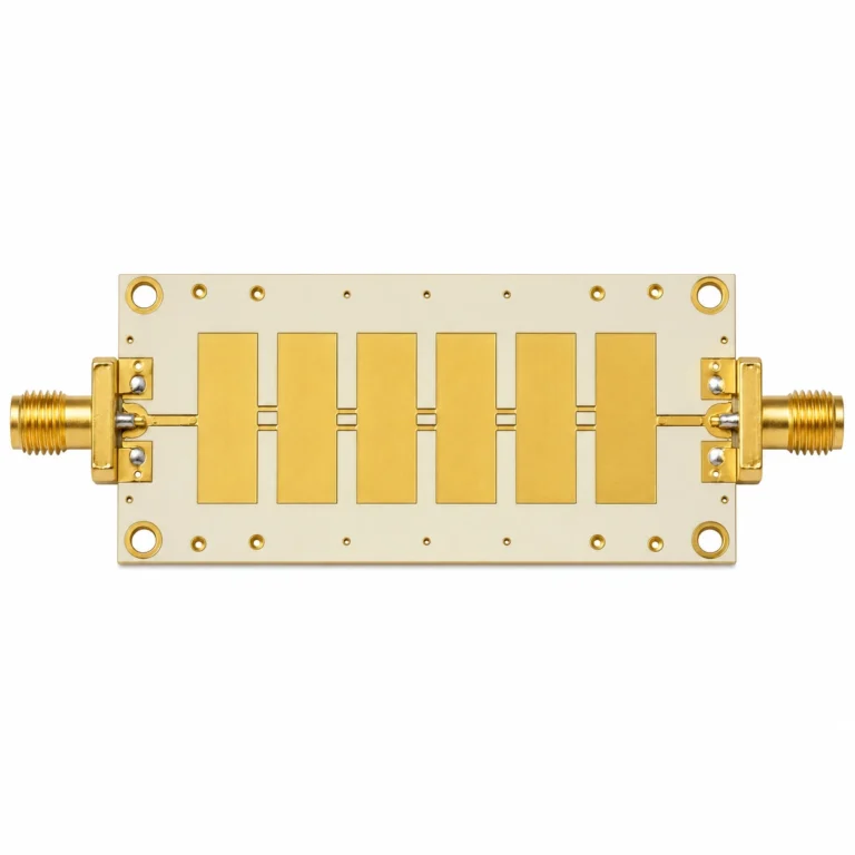 Rogers RO4003C PCB showing X-band microstrip filter circuit with SMA connectors on cream hydrocarbon ceramic substrate